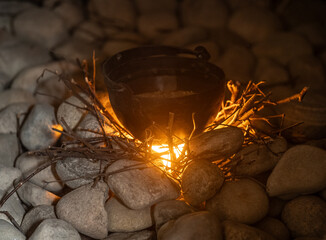 old cauldron on the fireplace