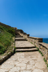 Azenhas do Mar is a seaside town in the municipality of Sintra, Portugal. Close to Lisboa. Azenhas do Mar white village, cliff and ocean. Sunny day.