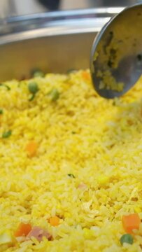 risotto Italian Risotto allo Zafferano rice with saffron in a white dish. White background.