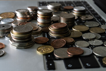View of the various coins on the laptop