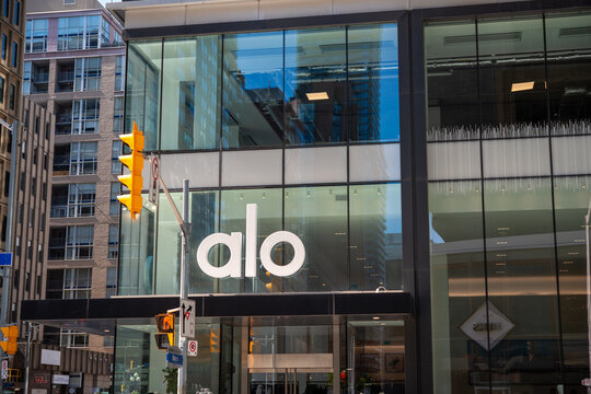 exterior facade and sign of Alo, a women's clothing store, located at 60 Bloor Street West in Toronto, Canada