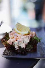 Sandwich with shrimps, with mayonnaise and greens