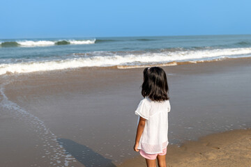 Girl by the Ocean