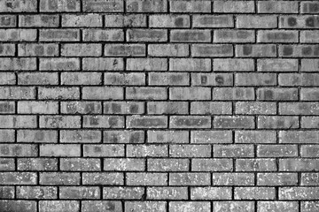 Gray old brick wall. Background texture.