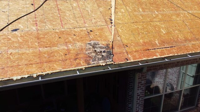 Roof decking with rotten wood under the shingles