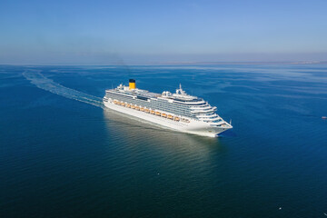 Aerial view of cruise ship in sea. Cruise liner sailing the ocean or sea on a sunny summer day