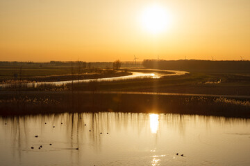 Sunset Over Pond with Mark River Near Terheijden