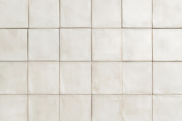 White square tiles with a slightly textured surface creating a soft and elegant look