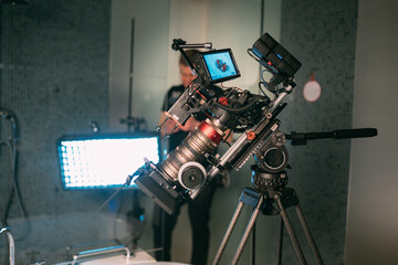 Professional cinema and video camera on the set. Shooting shift, lighting fixtures, shooting...