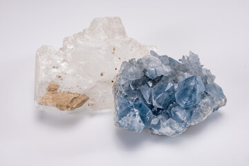 White and blue mountains crystal of colorless gemstone quarts, geology mineral background close up