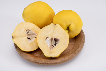 Group of ripe yellow quince apples close up