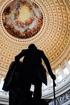 A Statue of George Washington inside the Rotunda of the US Capitol