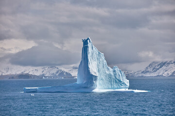 Iceberg Under the Sun in South Georgia Island. Everyone knows noontime is a bad time for photo taking, but the icebergs in South Georgia Island are beautiful at all times.