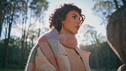 Reflective woman enjoy morning in tranquil forest closeup. Wanderer at sunlight