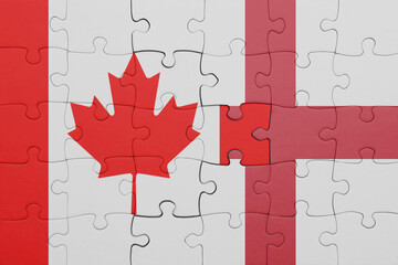 puzzle with the colourful national flag of england and flag of canada.