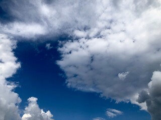 beautiful lush clouds on the blue sky