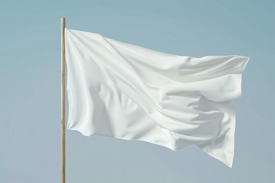 A white flag waving gently in the breeze on a sunny day, suitable for use as a symbol of surrender or truce