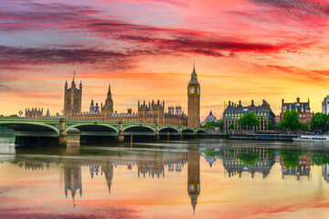 Big Ben and Westminster bridge at sunrise in London. England