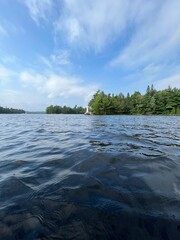 tropical island in the ocean from a boat and beautiful lake