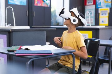 Biracial boy explores virtual reality in school