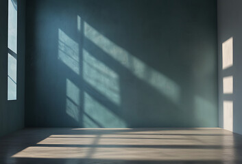  Shadow and light from windows on plaster wall. Minimal abstract light blue background for product presentation.