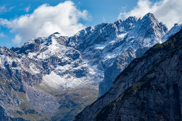 Snow capped peaks of the Dolomite Mountains in Italy after first snow fall of the Year - Summits of the beautiful Hiking trails of the Dolomiti National Park