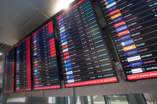 BANGKOK, THAILAND - OCTOBER 13, 2023: close up shot of digital flight information display system in Suvarnabhumi International Airport.