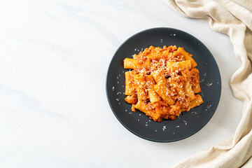 Rigatoni pasta bolognese with cheese