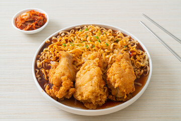 Korean instant noodles with fried chicken or Fried chicken ramyeon