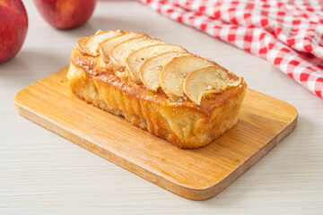 apple loaf crumbled on wood board