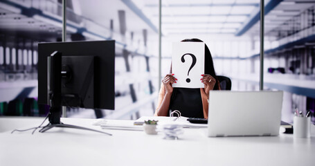 Businesswoman Holding Question Mark Sign On Paper
