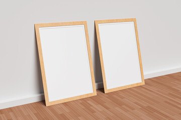 Poster with Wooden Frame Mockup standing on the floor. 