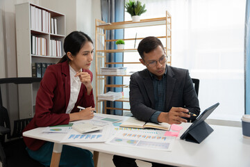 Asian Business Group Chat about graph work Present in meetings, in the office