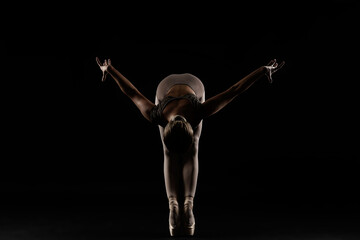 grace and charm of a ballerina's dance in a photo Studio
