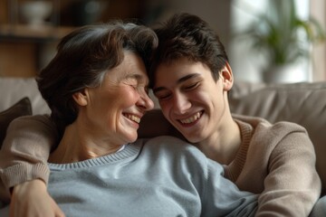 Fototapeta premium Intergenerational Connection: Grandmother and Grandson Bonding Moment on Cozy Couch