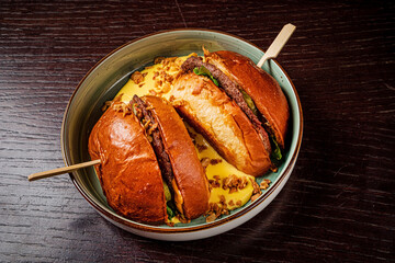 creative burger with cheese sauce