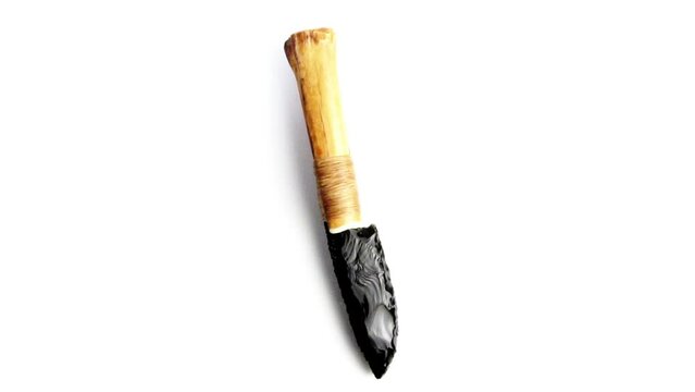 Stone Age Knife with obsidian Blade on white Background