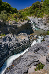 Summer landscape of Alcantara Gorges and Alcantara river Park in Sicily, Italy