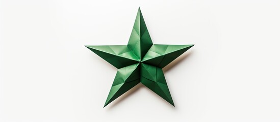 Obraz premium Origami star made of green paper against a white backdrop, perfect for copy space image.