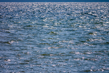Blue sea water surface background.