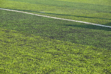 artificial green grass turf sport soccer field with black rubber granules infill