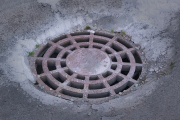 Cast-iron manhole cover storm sewer.