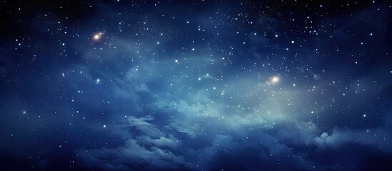 Obraz premium Astro photography of the Milky Way Galaxy against a blue night sky, featuring a spiral galaxy in the picture, with visible noise in the copy space image.