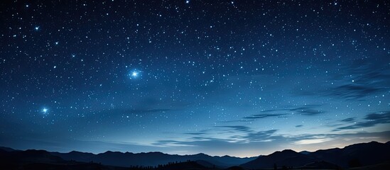 Naklejka premium Stunning panoramic view of the night sky with stars, grain effect, and carefully adjusted white balance, perfect for copy space image.