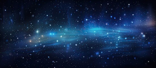 Blue starry night sky with star trails, copy space image.