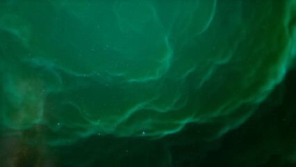 Cosmic background with a blue purple nebula and stars
