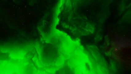 Cosmic background with a blue purple nebula and stars
