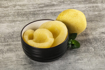 Canned yellow pear with syrup