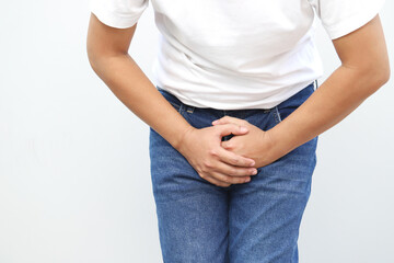 man covers groin, health problems disease for premature ejaculation, fertility, erection. The...