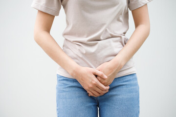 Woman having a stomachache, or menstruation pain. suffering from abdominal. Menstrual cramps. Healthcare and medical, gynecology concept.